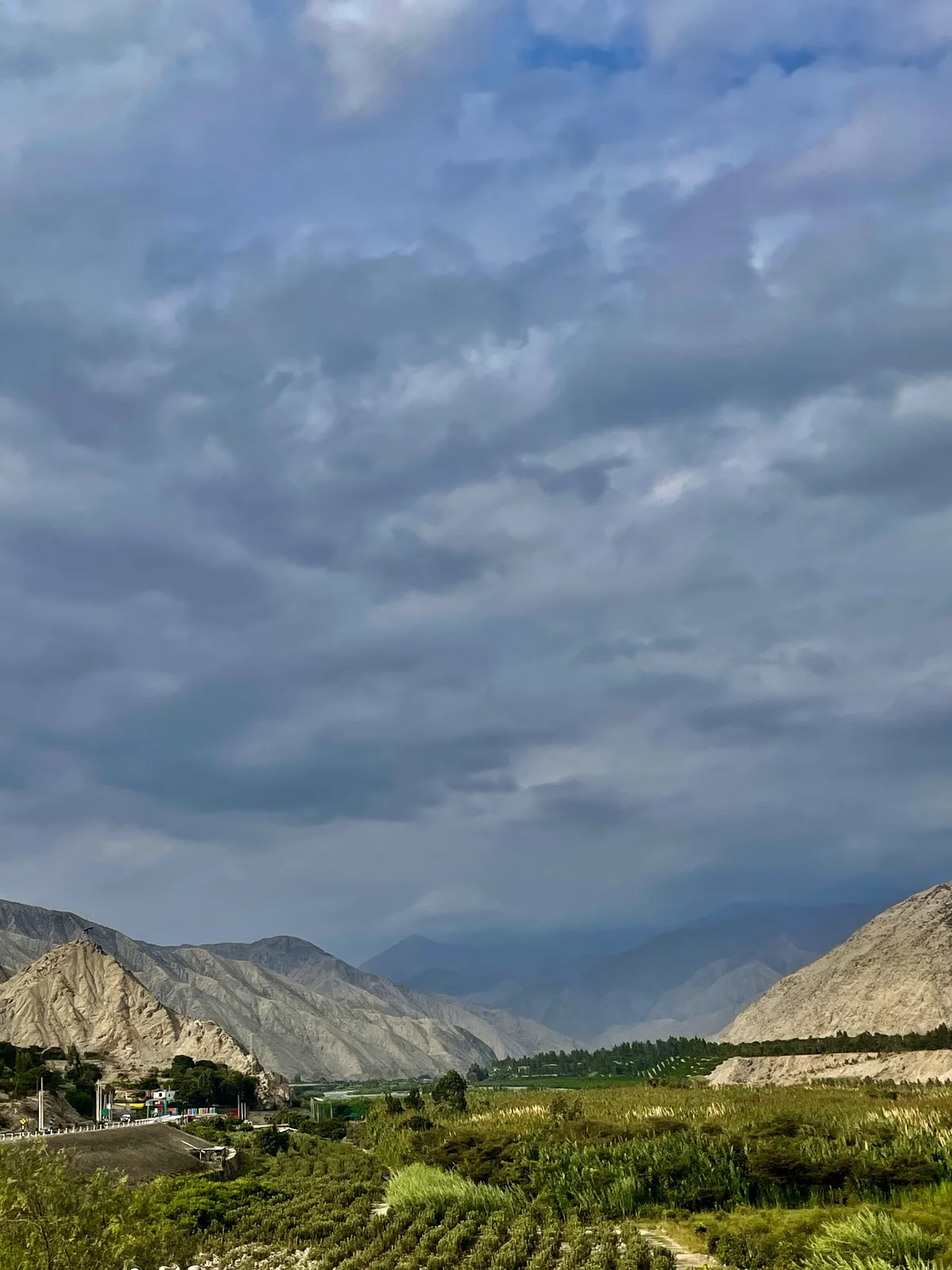 Cañete Valley under storm clouds